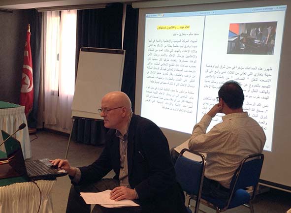 BBC veteran Russell Peasgood (left) reviews Libyan reporter’s article